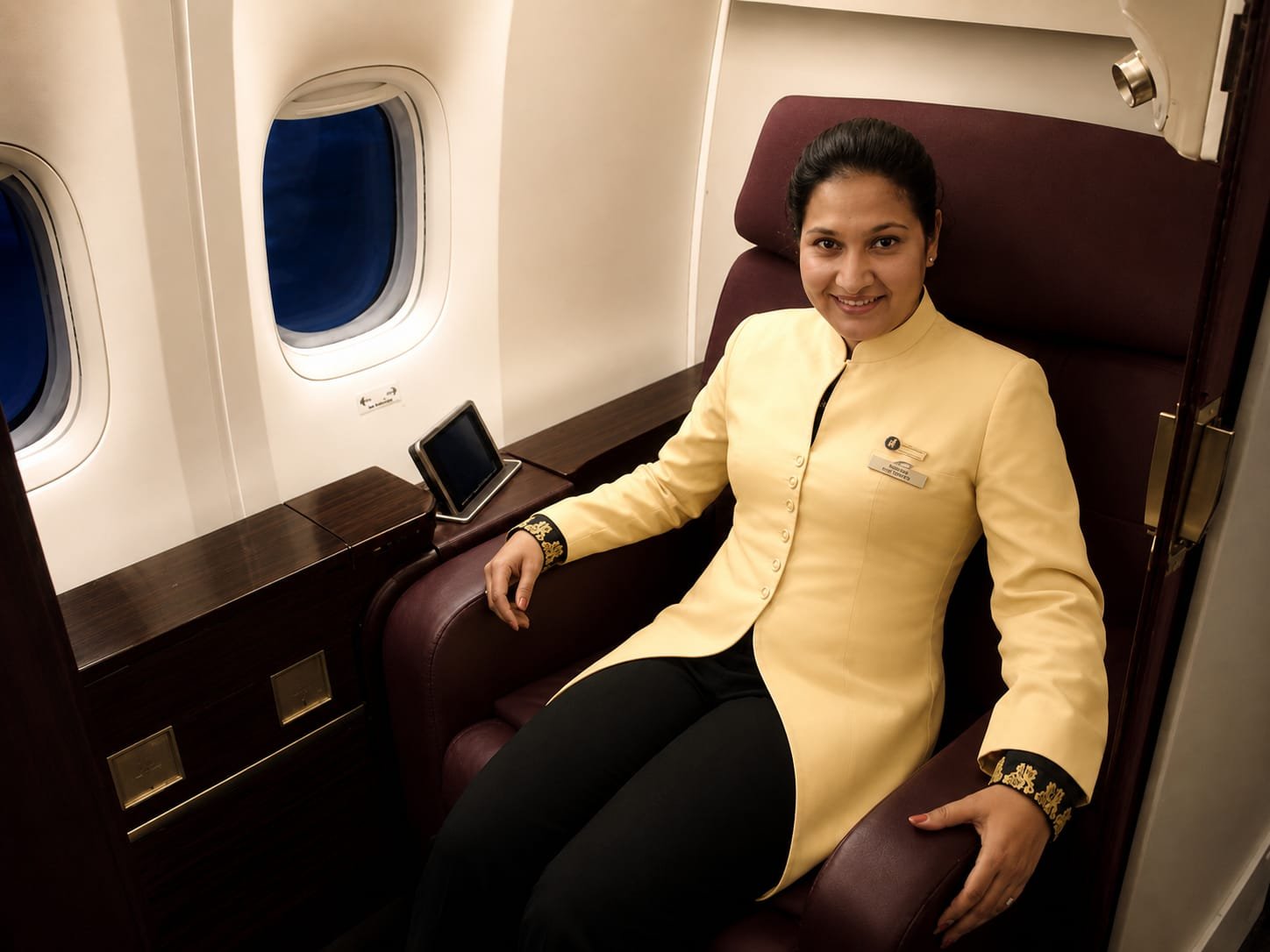 Senior inflight executive in a premium airline cabin
